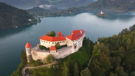 Beautiful-landscape-view-of-Bled-Castle-on-Lake-Bled,-Slovenia---aerial-view