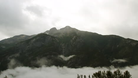 Heavy-overcast-cloud-and-ground-fog-in-coastal-mountain-timelapse