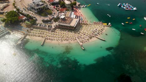 Slow-rotating-drone-shot-over-famous-Ksamil-Beach-in-Southern-Albania