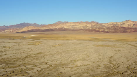 Birds-eye-view-over-rough,-rugged,-hot-and-dry-terrain-of-Death-valley-national-park