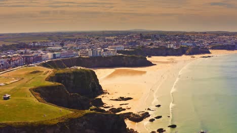 Late-afternoon-aerial-view-over-the-private-beaches-of-Lusty-Glaze-near-Newquay-in-Cornwall