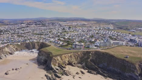 Aerial-pull-out-shot-over-the-town-of-Lusty-Gaze-Cornwall-England