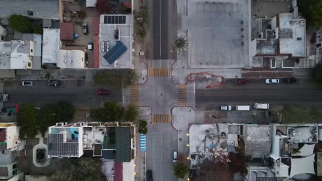Aerial:-top-down-view-of-quiet-crossroad-junction-in-Mexican-city-La-Paz