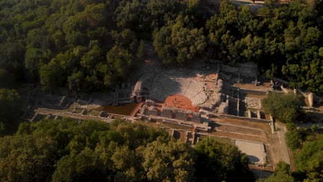 Aerial-view-of-amphitheater-in-Butrint,-Albania-inside-forest