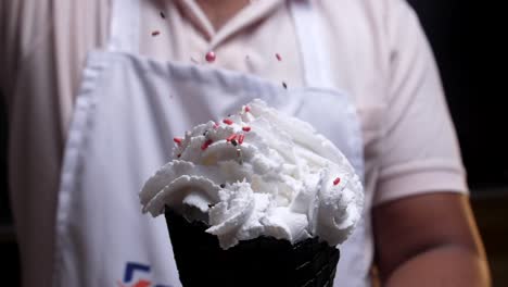 ice-cream-cone--decorating-closeup-shot
