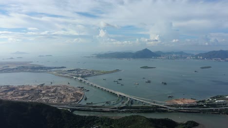 Instalaciones-De-Cruce-Fronterizo-De-Hong-Kong-Y-Puente-Principal-Y-Sistema-De-Carreteras-En-Construcción,-Vista-Aérea
