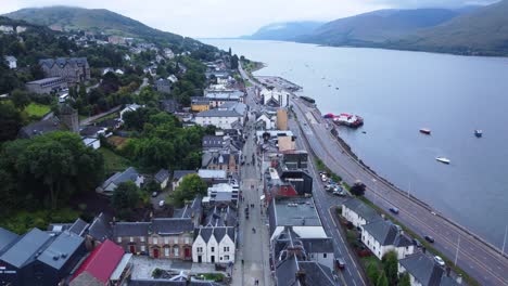 Pedestrian-Street-in-Fort-William-Town,-West-Highland-Museum,-Town-Centre---Aerial-Drone-4K-HD-Footage
