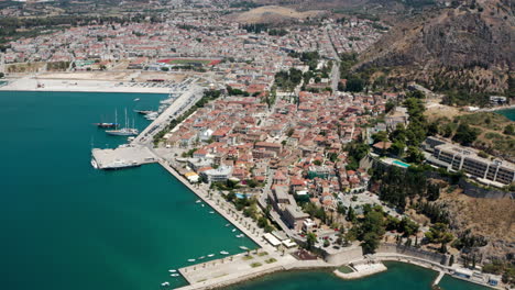Panoramic-View-Of-Peloponnese-Old-Town-Cityscape,-Nafplion-City,-Greece---aerial-drone-shot
