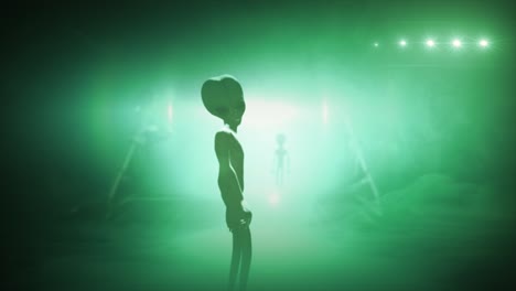 3D-CGI-VFX-animation-of-a-classic-Roswell-grey-alien-turning-to-look-back,-in-front-of-the-glowing-lights-of-a-UFO-fyling-saucer,-with-green-color-tint
