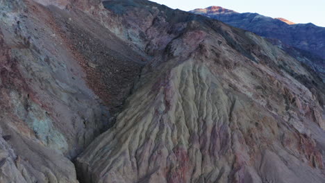 Aerial-drone-over-the-Black-Mountains-along-Artist's-Drive-in-Death-Valley,-California