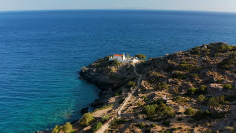 Small-Church-Of-Sotiros-Christou-Near-Loutro,-Crete-Island,-Greece---aerial-drone-shot