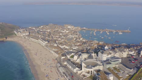 Wide-aerial-view-over-Porthmeor-Beach-to-St-Ives-in-Cornwall-England