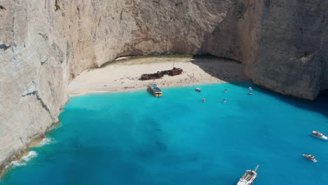 Idyllic-View-Of-Beautiful-Navagio-Beach-On-Zakynthos-Island-In-Greece---aerial-drone-shot