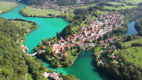 Aerial-view-of-Most-Na-Soci-lake-with-beautiful-turquoise-colors-near-Tolmin-in-Slovenia