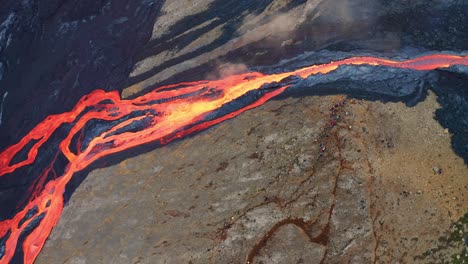 Lava-River-Flowing-In-The-Valley-During-Eruption-Of-Fagradalsfjall-Volcano-In-Reykjanes,-Iceland