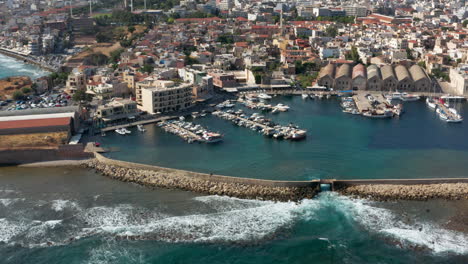 Chania-Port---Boats-Moored-At-Chania-Marina-With-Neoria-Venetian-Shipyards-In-Greece