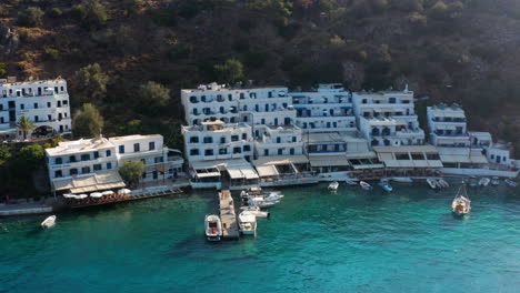 Magnificent-Architecture-And-Scenic-Coast-Of-Loutro-Village-in-The-Southern-island-of-Crete,-Greece---Aerial-shot
