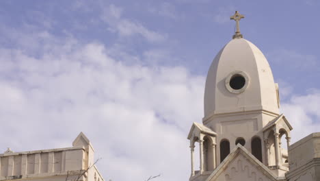 Christian-Cross-atop-Church-in-San-Juan,-Puerto-Rico---Static-Low-Angle