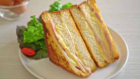 homemade-sandwich-ham-cheese-on-white-plate