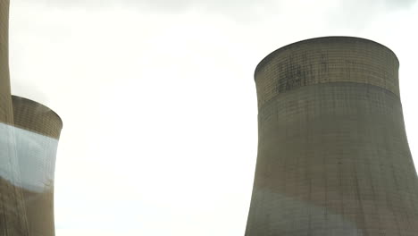 Driving-past-large-condensing-towers-at-a-coal-fired-power-station