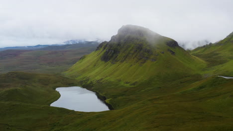 Wide-drone-shot-of-Quiraing-the-landslip-on-the-eastern-face-of-Meall-na-Suiramach-in-Scotland