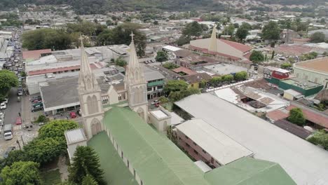 Aerial-View-Of-Parroquia-Nuestra-Señora-del-Carmen-In-Santa-Tecla,-El-Salvador-At-Daytime---drone-shot