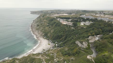 Aerial-view-of-the-beach-of-Church-Ope-on-the-island-of-Portland,-in-Dorset-UK