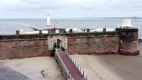 Fort-Perch-Rock-New-Brighton-sandstone-coastal-defence-battery-museum-aerial-view-slow-push-in