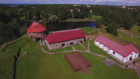 A-drone-flight-view-over-the-Museum-fortress-Korela-with-its-beautiful-lake-and-forest-surrounded-Russia