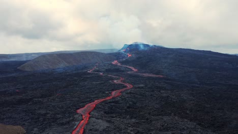 Lava-Flows-On-An-Active-Volcano,-Mount-Fagradalsfjall,-Iceland---aerial-drone-shot