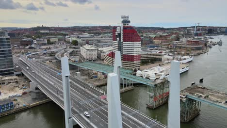 New-Iconic-Structure-In-Downtown-Gothenburg,-The-Hisingsbron-Bridge---aerial-drone-shot
