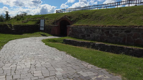 A-beautiful-path-made-of-tiles-towards-the-entrance-of-museum-fortress-korela,-Russia