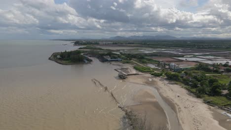 4K-Aerial-Drone-Footage-Along-a-Coastal-Village-in-the-Gulf-of-Thailand-near-Hua-Hin