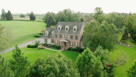 Three-story-red-brick-mansion-in-rural-America