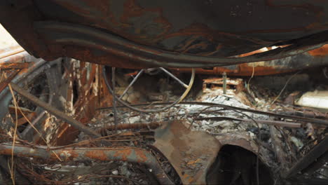 Interior-of-a-burned-and-corroded-rusty-car