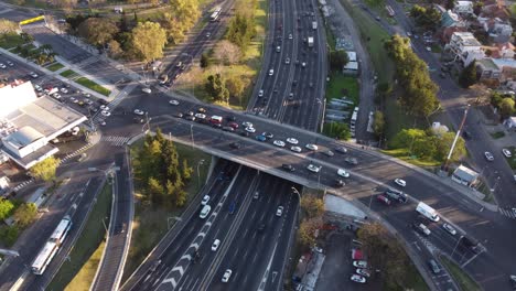 Aerial-top-down-shot-of-busy-junction-bridge-and-Pan-American-Highway-in-Buenos-Aires,Argentina