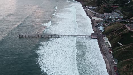 Saltburn-By-The-Sea,-Aerial-Footage,-DJI-Inspire-2-–-Clip-10,-Movement:-Pull-out-from-pier