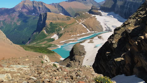 Steady-shot-of-the-glacial-valley-surrounded-with-majestic-hills-and-mountains-in-the-Grinnell-Glacier---Glacier-National-Park