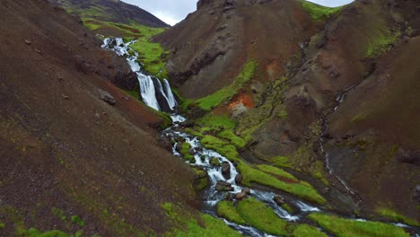 Flyover-Hot-Spring-River-At-Reykjadalur-Valley-In-South-Iceland