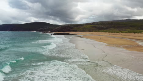 Cinematic-drone-shot-of-waves-on-Sanwood-Bay-Beach-in-Sutherland-Scotland