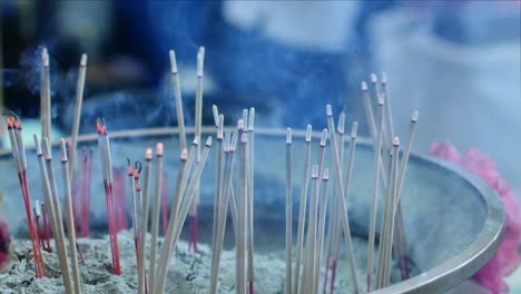 Selective-focusing-4k-video-on-the-smoke-stick-for-spiritual-cultural-in-Chinese-temple