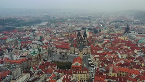 Aerial-cinematic-view-of-Church-of-Our-Lady-and-easter-market-in-Prague