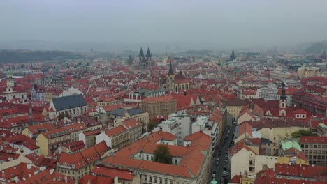 Aerial-cinematic-view-of-the-Prague-Old-Town-and-Church-of-Our-Lady-and-easter-market-in-Prague