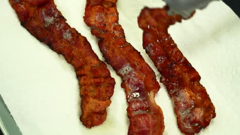 Shot-of-crispy-bacon-just-after-being-fried