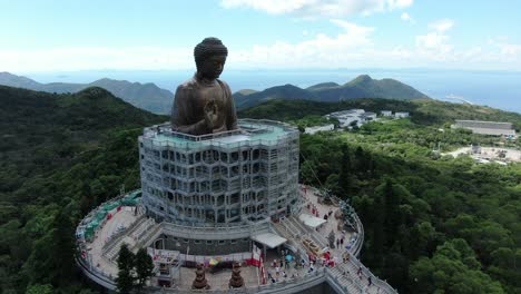 Hong-Kong-Nong-Ping-big-Buddha-and-surrounding-lush-green-environment,-Aerial-view