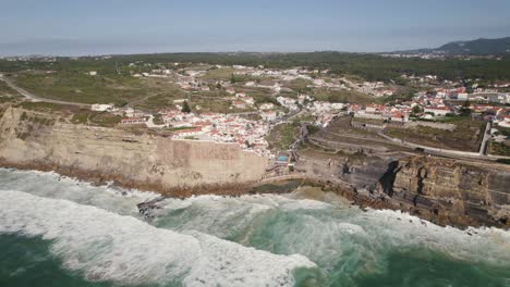 Majestic-luxury-town-on-high-cliffside-in-seaside-of-Portugal,-aerial-drone-view