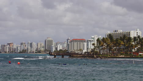 Holiday-apartment-buildings-of-Condando-Beach,-view-across-El-Boqueron-Bay,-San-Juan,-Puerto-Rico
