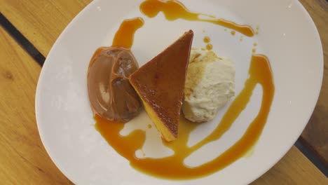 Close-up-top-down-of-traditional-Argentinian-Creme-Caramel-Dessert-served-on-fancy-plate-in-restaurant