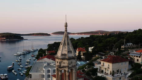 Hvar-Bay-And-Yachting-Harbor,-Island-In-Dalmatia-Archipelago-Of-Croatia---aerial-drone-shot