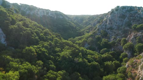 Quick-drone-flight-through-the-gorge-in-avatar-mountains-Kythira,-Greece